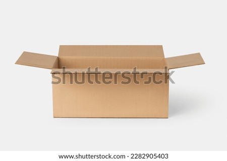 Cardboard box for delivery, parcels. On a light background Royalty-Free Stock Photo #2282905403