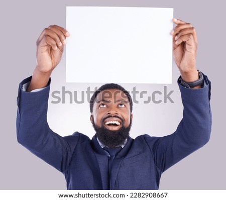 Business, excited man and poster in white background, studio or mockup space. Happy corporate, black male and holding board, marketing wow news and advertising banner for blank mock up, paper or sign