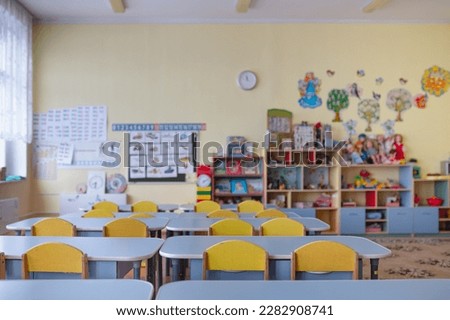 a general view of the group in the kindergarten, a room for children with toys. High quality photo Royalty-Free Stock Photo #2282908741