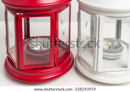 Red and white lantern with a candle, white background