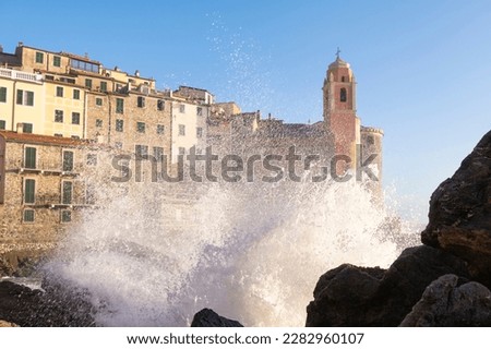 Strong sea waves breaking on Tellaro, ancient and small village near Lerici, in the Gulf of La Spezia (Golfo dei Poeti) Liguria, Italy, Europe
