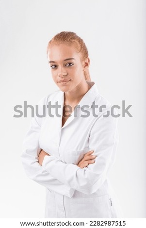 Young female researcher or scientist in a white lab coat, with blonde hair and blue eyes, hoping to contribute to improving the world with her dedication, sharing knowledge, gaining insights, 