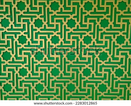 Green and yellow Islamic background with traditional style arabic. Seamless pattern for card, background, fabric or abstract design. Muslim ornament.