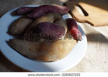 boiled cassava served on a white plate