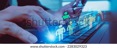 Human resources recruitment employment headhunting concept,with officer using smart tablet computer,via futuristic visual interface program technology choose employee,manage and strategy in corporate Royalty-Free Stock Photo #2283029323