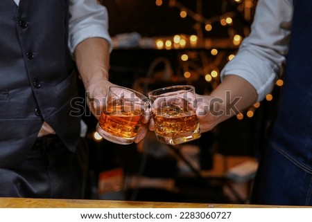 whiskey, for a friendly party in a bar or a restaurant. Royalty-Free Stock Photo #2283060727