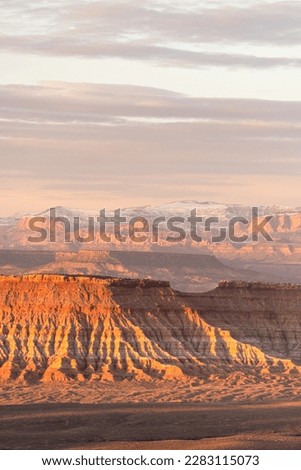 Mix of desert and mountain landscape in southwest. Rock formations, snow and vast landscape Royalty-Free Stock Photo #2283115073