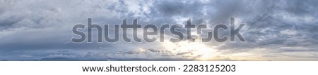 Panorama of beautiful summer sunset sky with blue clouds, Evening good weather, Sky background.