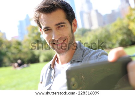 Man taking picture of himself in Central Park