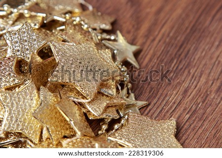 Christmas decoration golden stars over rustic Elm wood background - retro style design, copy space