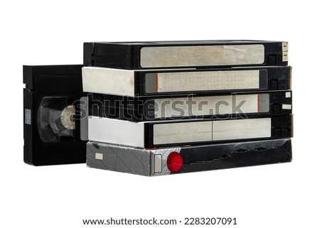 Pile of VHS video cassettes. Vintage media. Isolate on a white background. Royalty-Free Stock Photo #2283207091