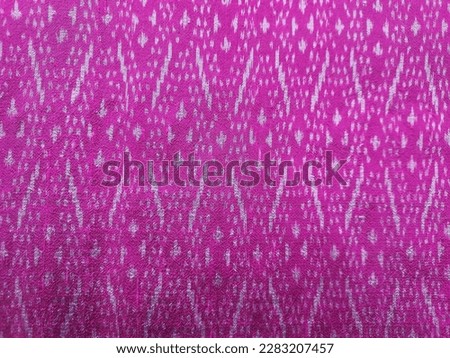 picture of Thai silk ,hand-woven,pink,silver gray,floral pattern,stripes,beautiful,luxurious,bright