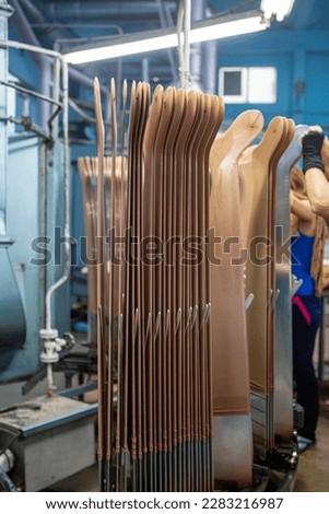 production of capron tights. Textile factory with machines and equipment for production of women's stockings and capron tights.