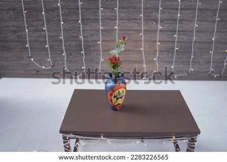 A beautiful creative pot in table. selective focus, shallow depth of field, or blur.
