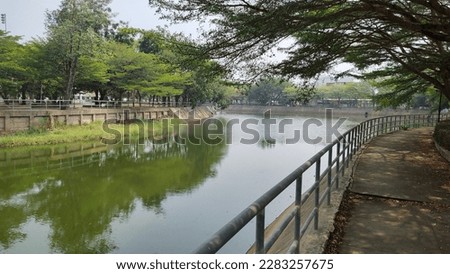 River canal view of landscape gardens in Thailand