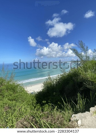 Turquoise sea on white sand beach in brazilian coast. Top view from the trail. Praia Grande, Arraial do Cabo, RJ. Brazil. 
 Royalty-Free Stock Photo #2283304137