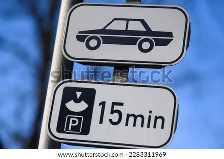 Parking sign in the city, allowing 15 minute parking