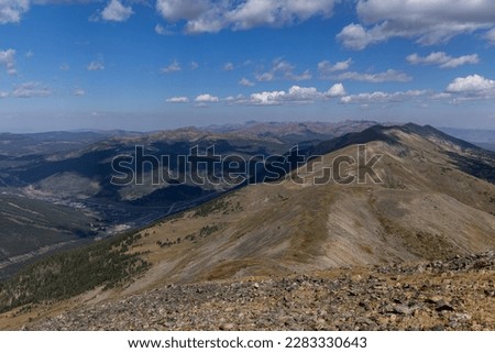 Copper Mountain and the Eaglesnest Wilderness can be seen from the top of the Impire Superchair during a summer hike at Breckenridge Ski Resort