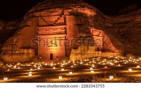 Ancient tombs of Hegra city illuminated during the night, Al Ula, Saudi Arabia Royalty-Free Stock Photo #2283343755