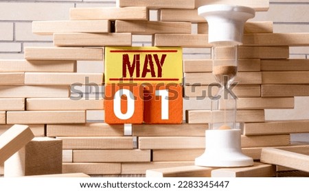 May 1st. Image of may 1 wooden color calendar on white background. Spring day, empty space for text. International Workers' Day Royalty-Free Stock Photo #2283345447
