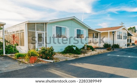 Mobile home park, age-restricted (55+) community in small beach town in California. Architecture, street view Royalty-Free Stock Photo #2283389949