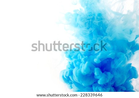 Cloud of ink in water isolated on white Royalty-Free Stock Photo #228339646
