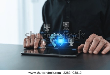 Businessperson or university student using tablet for online education learning or knowledge studying via internet at home. Distance learning and training course or class or e-learning via cyberspace
