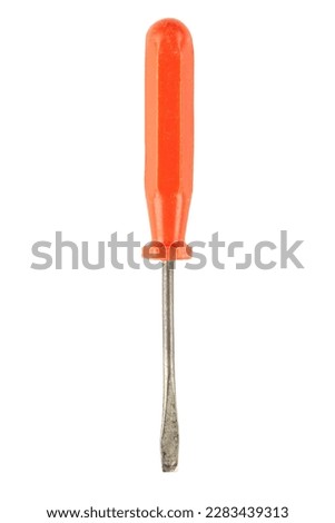 Orange flat head screwdriver isolated on white background. Work tool. File contains clipping path.