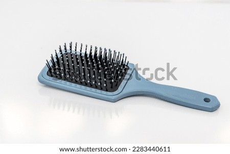 Hairstyling hair brush on white isolated background Royalty-Free Stock Photo #2283440611