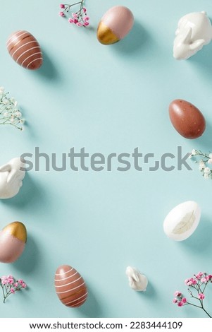 Happy Easter poster, vertical banner with Easter eggs, bunnies, minimalist flowers. Easter frame. Flat lay, top view.
