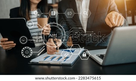 API Application Programming Interface, woman using laptop, tablet and smartphone with virtual screen API icon Software development tool, modern technology and networking 
