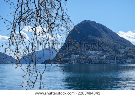The view from Ciani Park (Parco Ciani), in Lugano, Ticino, Switzerland, over Lake Lugano to Paradiso. Royalty-Free Stock Photo #2283484341