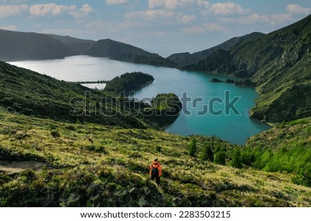 Lagoa do Fogo is a crater lake within the Agua de Pau Massif stratovolcano in the center of the island of Sao Miguel in the Portuguese archipelago of the Azores Royalty-Free Stock Photo #2283503215