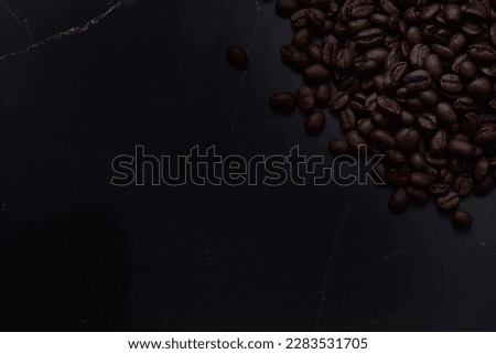 Picture of dark brown roasted coffee beans