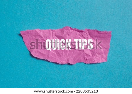 Quick Tips concept with crumpled pink paper