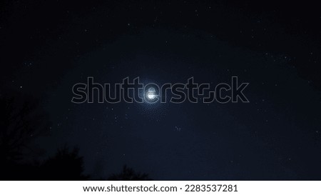 starry night sky and full moon. Background of the beautiful dark blue starry sky and bright star.
