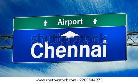 Road sign indicating direction to the city of Chennai.