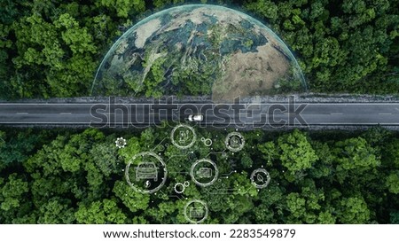 Electric vehicle car going through forest, EV electrical energy for environment, Nature power technology sustainable devlopment goals green energy, Ecosystem ecology healthy environment road trip Royalty-Free Stock Photo #2283549879