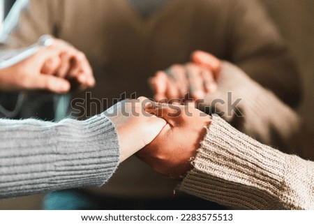 Small group of asian people praying worship believe. Teams of friends worship together before studying Holy bible. family praying together in church. Small group learning with prayer concept. Royalty-Free Stock Photo #2283575513
