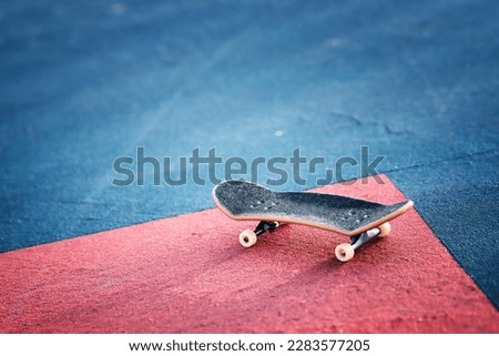 Concept image of skateboard and urban view