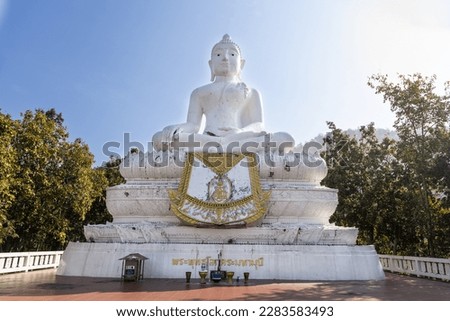 Wat Phra That Mae Yen, or Big White Buddha is huge white Buddha stands on a hill with 353 steps, in Pai, Thailand. Thai words translated as Lord Buddha in English language.