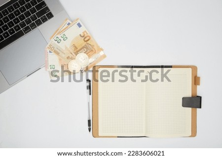 euro and bitcoin banknotes, cryptocurrency and blockchain concept on white background flat lay