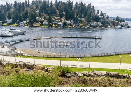 A view of the pier at Meydenbauer Bay Park in Bellevue, Washington. Royalty-Free Stock Photo #2283608449