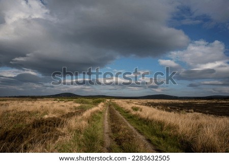 The vast country of Bangor Erris Bog, County Mayo, Ireland. Dark clouds are gathering, rain is coming. Royalty-Free Stock Photo #2283632505