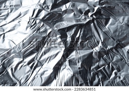 Shiny foil silver background macro close up view