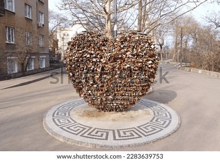 Love locks hang on the huge heart in Odessa, Ukraine