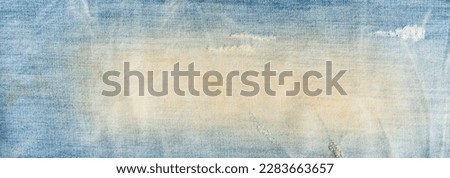 torn denim fashion jeans design texture. Blue denim jeans texture banner with copy space for text design background. Canvas denim fashion texture. Panoramic fashion banner Royalty-Free Stock Photo #2283663657