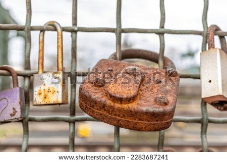 rusty metal lock on the bridge