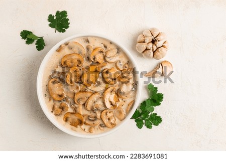 champignons in creamy garlic sauce, with herbs and spices, gravy, sauce, no people, Royalty-Free Stock Photo #2283691081