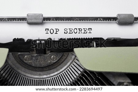 Text Top Secret typed on retro typewriter Royalty-Free Stock Photo #2283694497